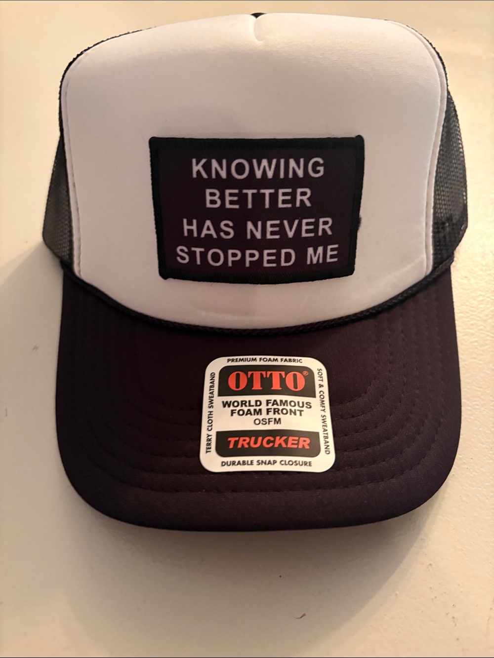 OTTO Black and White Kids Trucker Hat with 'Knowing Better' Patch